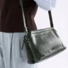 Denne crossbody-väska