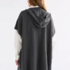 Neuwt poncho med huva Neuwt poncho med huva