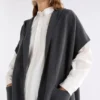 Neuwt poncho med huva Neuwt poncho med huva